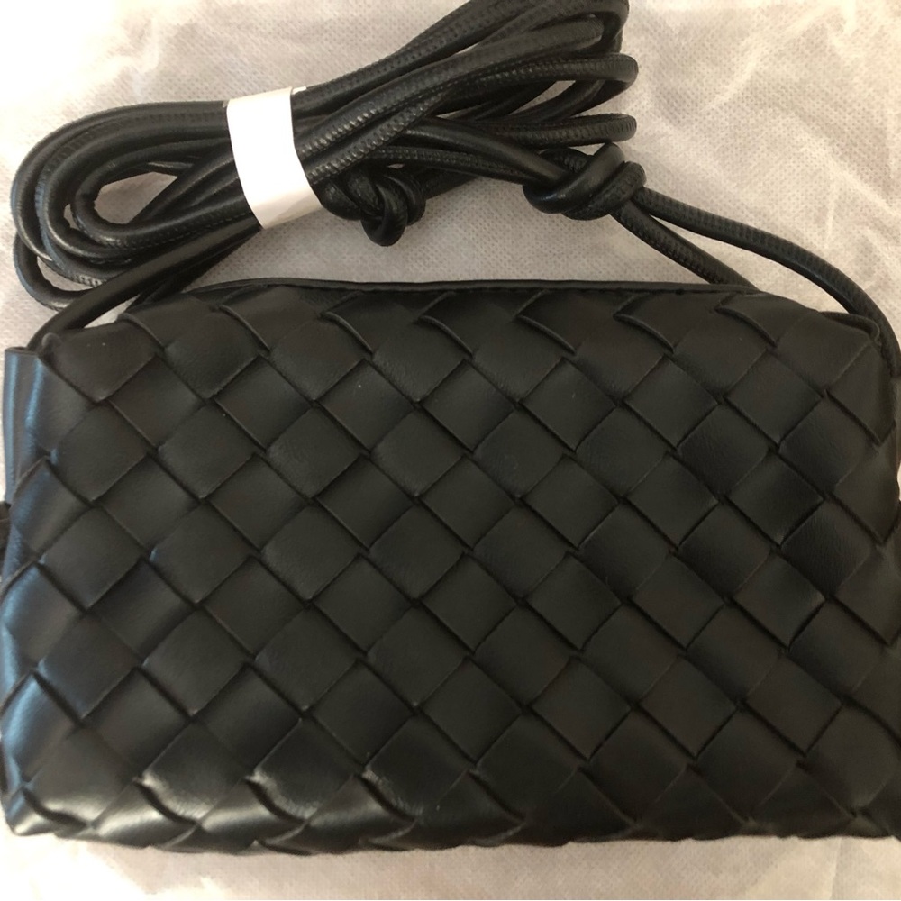 Never used black purse - a great version of mini loop camera bag